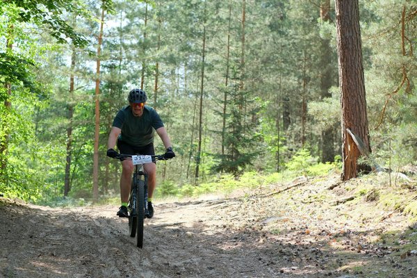 How does participation in sports influence academic performance among UK students?